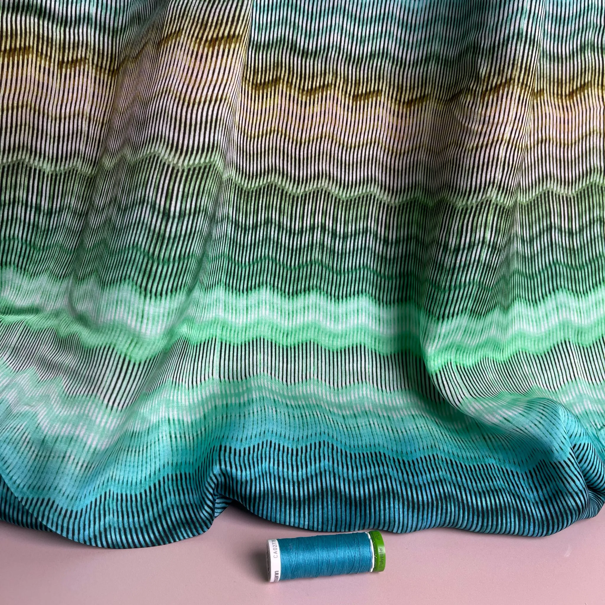 Hazy Waves in Ocean Viscose Sateen Fabric